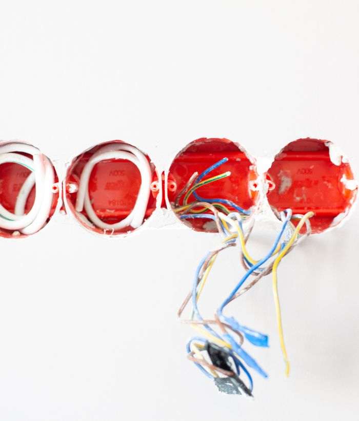 Exposed wiring at wall sockets